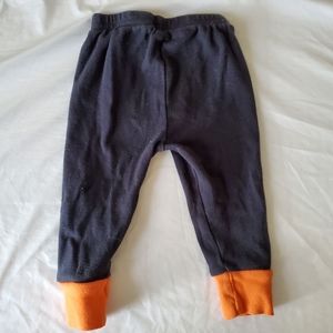 Black and orange infant pants